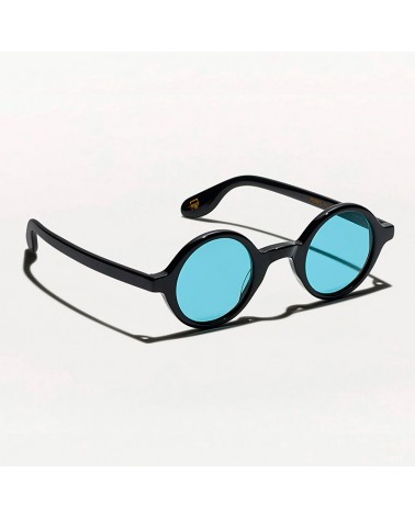 Las Zolman sun en black con lentes minerales azules vista 3q