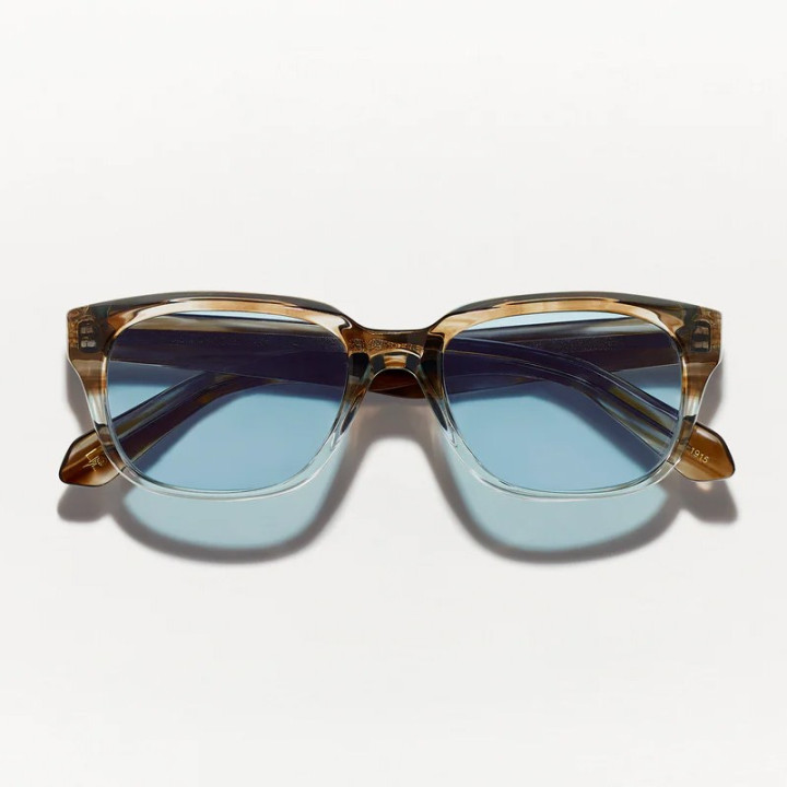Las Zindik Sun en Brown Smoke con lentes minerales azules