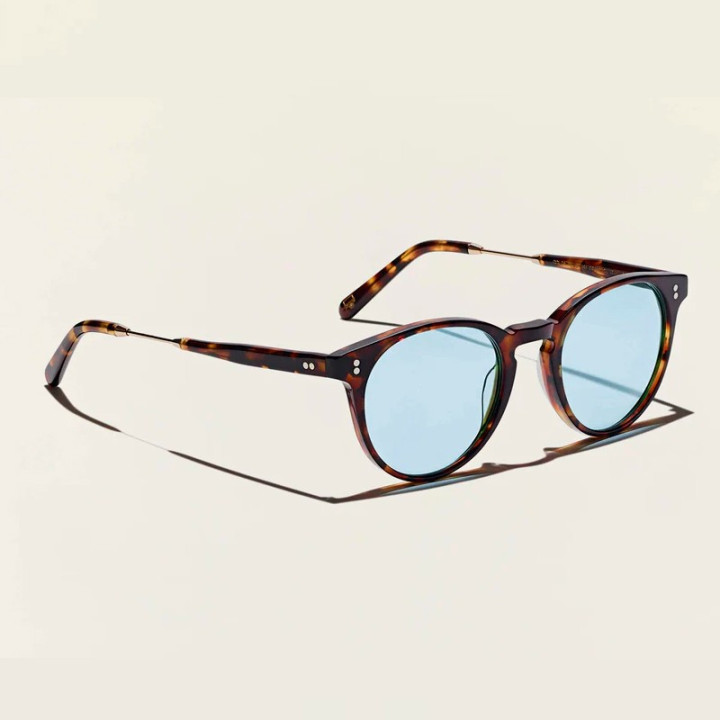 Las Golda sun spot tortoise gold con lentes minerales azules vista 3q